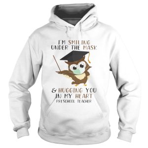 Im smiling under the mask and hugging you in my heart preschool teacher shirt 1