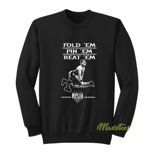 Rhea Ripley’s Fold ‘Em Pin ‘Em Beat ‘Em Sweatshirt