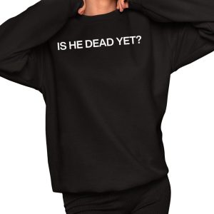 Joan Baez Wearing Is He Dead Yet Shirt